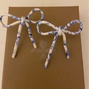 Acrylic bow statement earrings